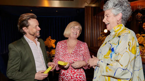 Photo showing Maxine Laceby, Eva Proudman and Michael Douglas laughing and talking together