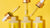 Photo showing three opened bottles of Maxerum on a yellow background